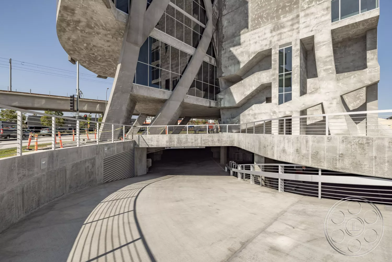 The main entrance to The (W)rapper, featuring a dramatic curved driveway and subterranean garage access—ideal for load-ins, crew parking, and seamless equipment drop-offs for productions.